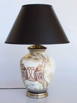 Brown and off white monkey lamp