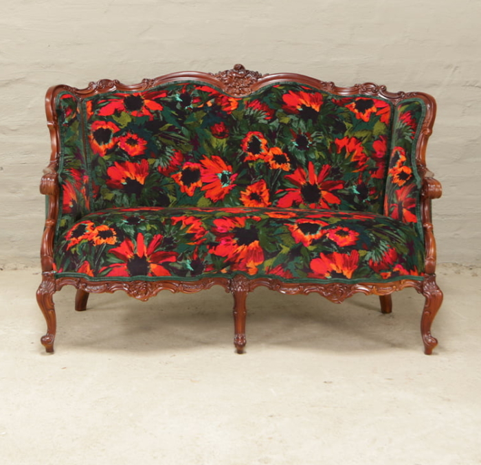 antique french carved sofa in bright colours