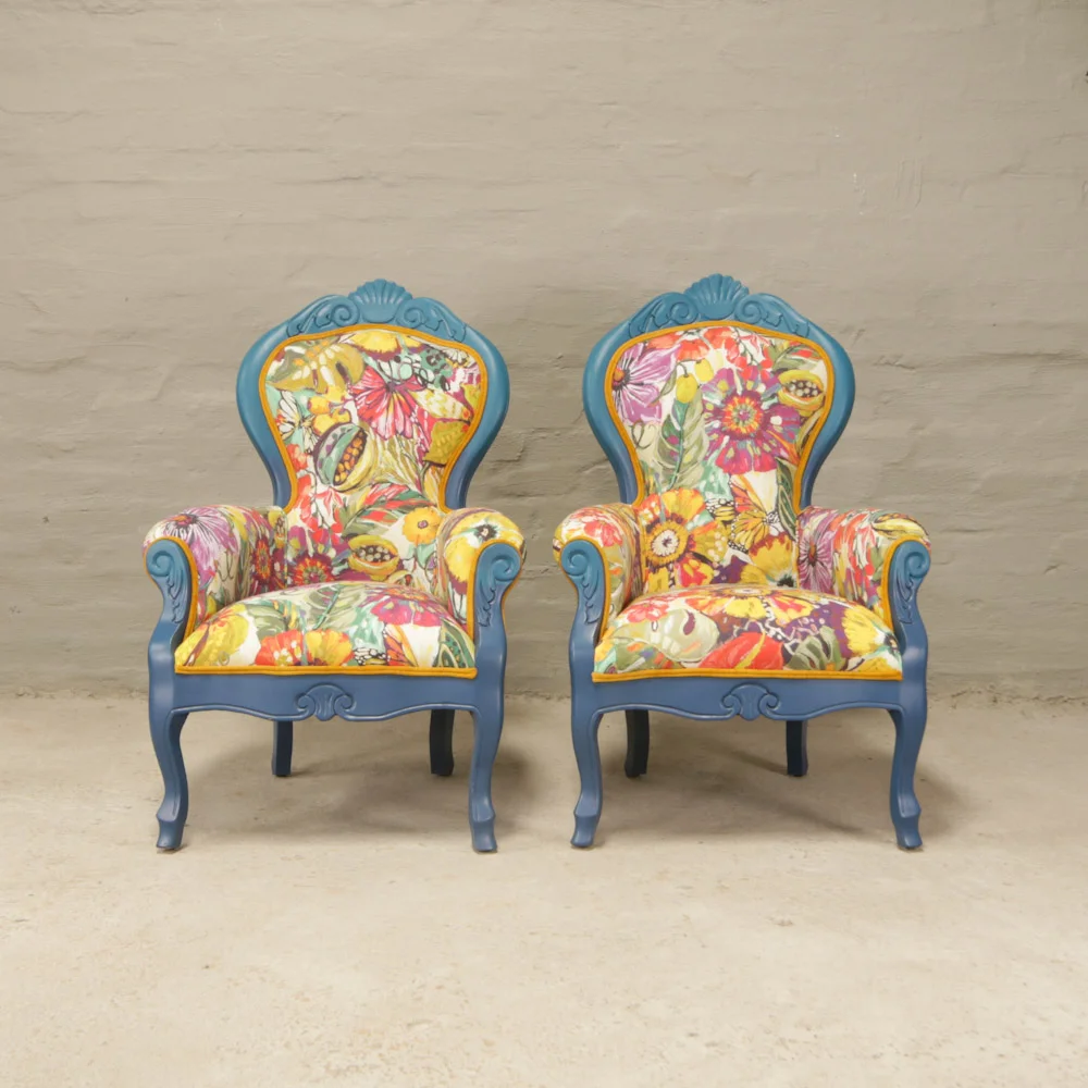 Victorian carved armchairs in bold florals