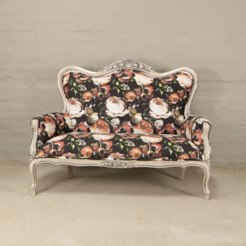 victorian carved sofa with floral velvet