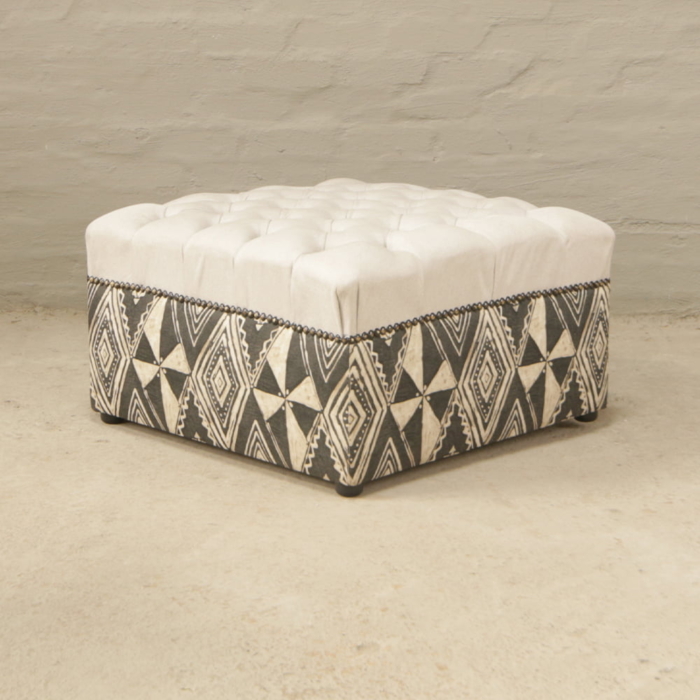 button tufted ottoman in ethnic fabric