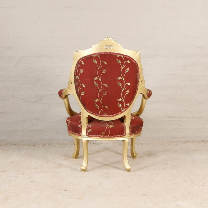french style golden armchairs