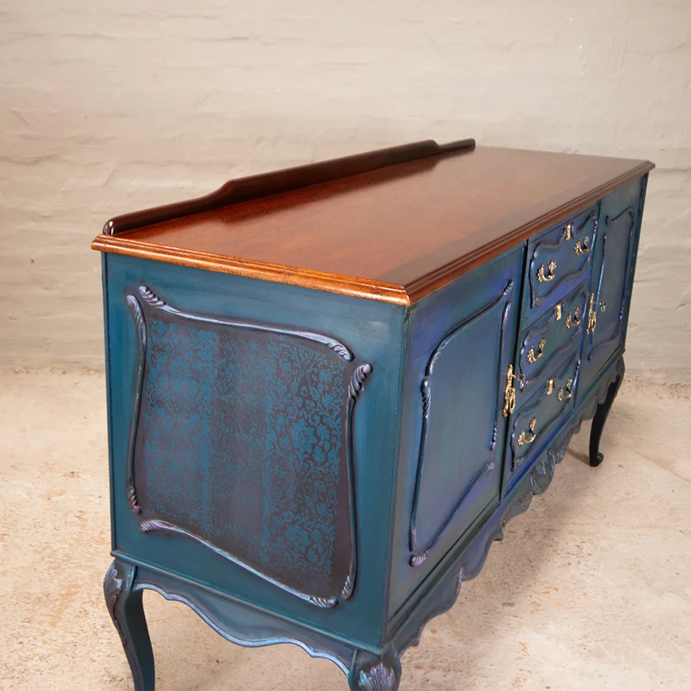 sideboard with blue and green paint technique