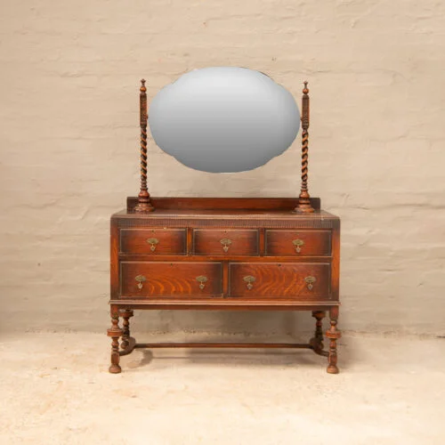 Antique dressing chest with oval mirror