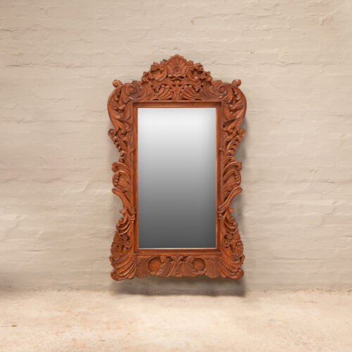 Heavy carved frame mirror