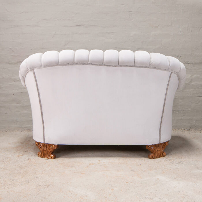 Two seater high button sofa