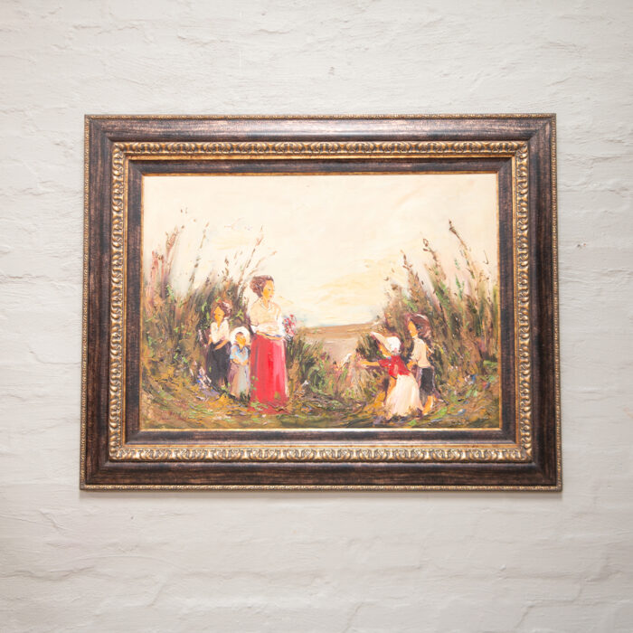 Mother with children in field on oil