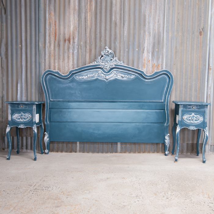 Blue french headboard and pedestals