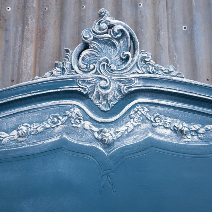 Blue french headboard and pedestals